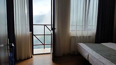 Family Room with Balcony and Mountain View