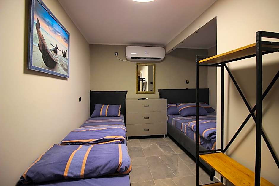 Photo 1 of 7 of Quadruple Room