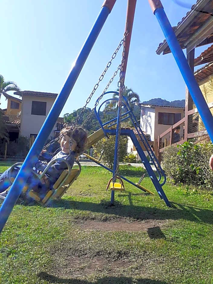 Chalé Praia Boiçucanga wi fi piscina Village Mirante Litoral Norte SP