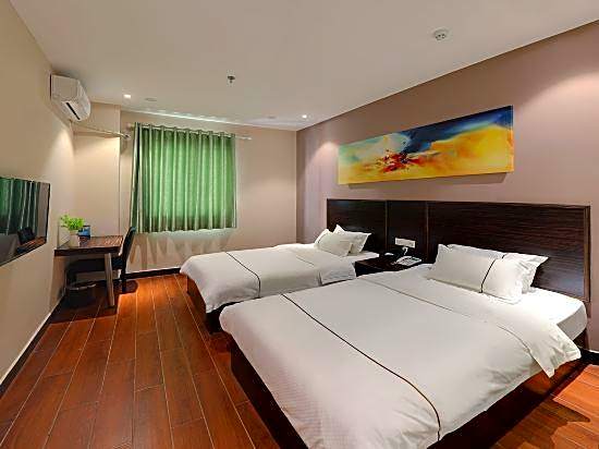 Xingyi Chain Hotel Jiangxia Metro Station