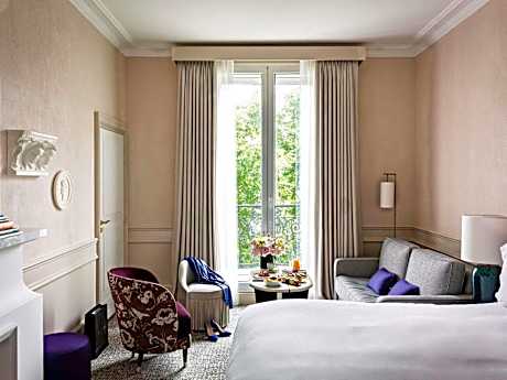 Junior King Suite with One King Bed/One Sofa Bed and Living Room - Courtyard or Rue Scribe View