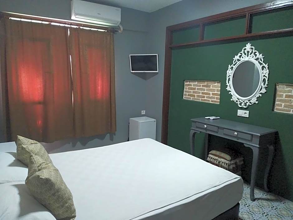 Casa Magnolia Boutique Rooms