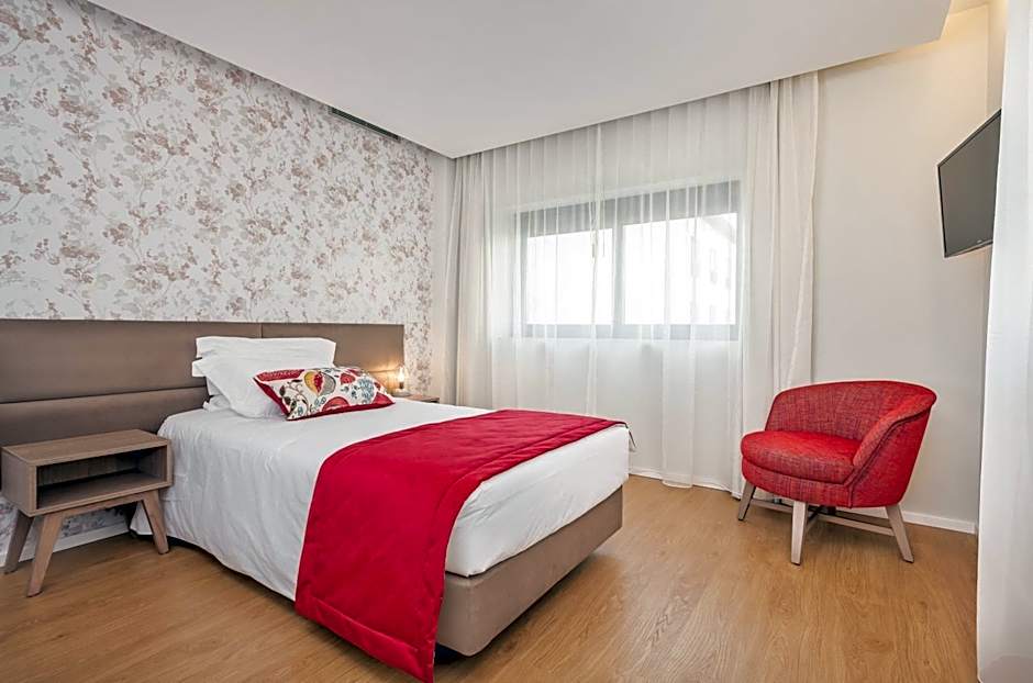 Essence Inn Marianos Hotel