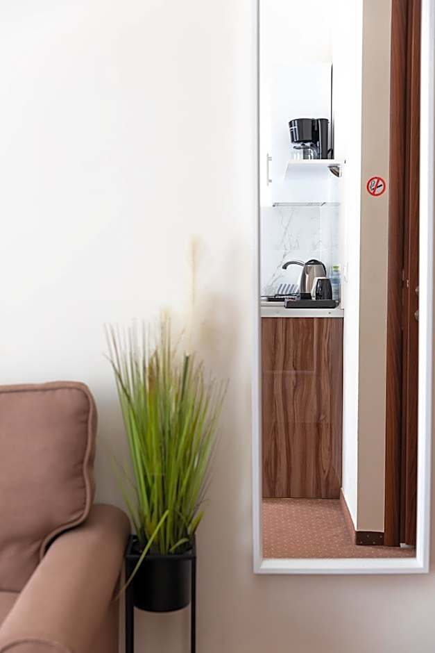 City Plaza Apartments & Rooms