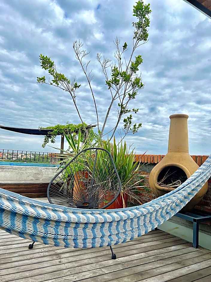 Departamento en planta baja con patio, dos habitaciones con dos ba¿os completos sala y cocina integral Vistas desde la azotea de