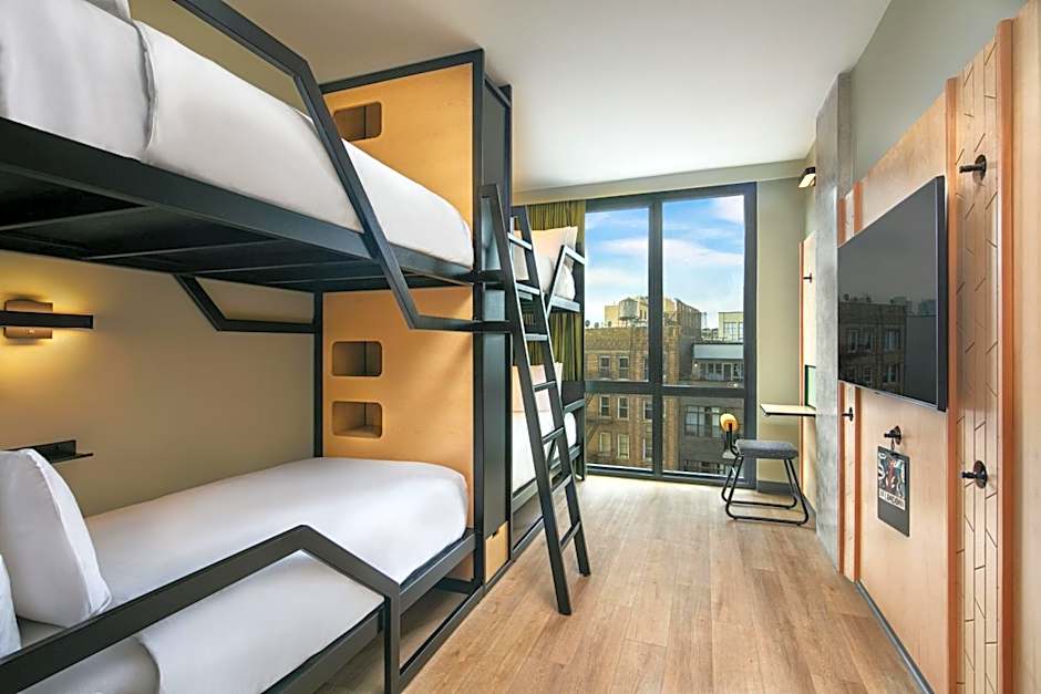 Photo 1 of 4 of Room with One Set of Bunk Beds and City View