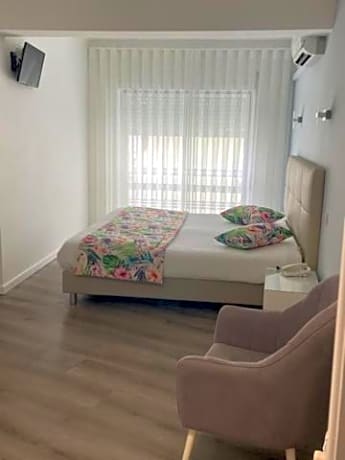 Double or Twin Room with Extra Bed (2 Adults + 1 Child)