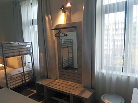 Single Bed in Dormitory Room