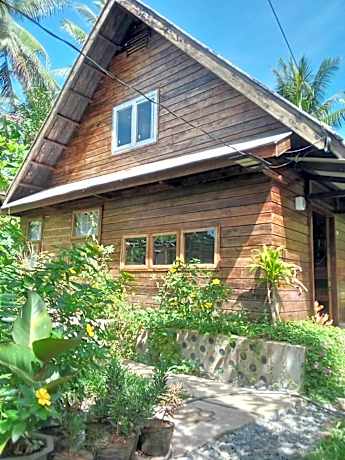 Bayawan Sunset Inn next to julsam and orange house