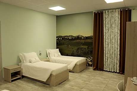 Quadruple Room with Private Bathroom