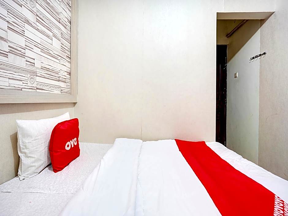 OYO Life 90606 Glass House Citraland Syariah