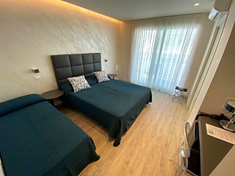 Deluxe Triple Room with Side Sea View
