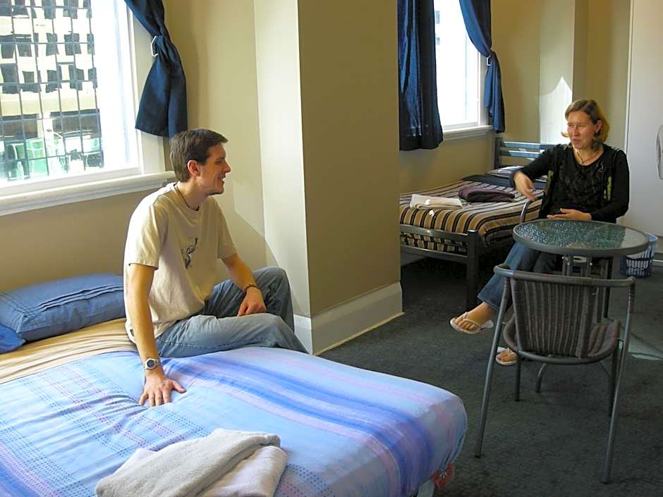 Surf 'N' Snow Backpackers Across Sky Tower