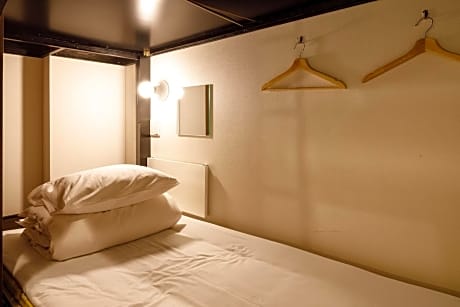 Set of 2 Upper Bunk Beds in Female Dormitory Room