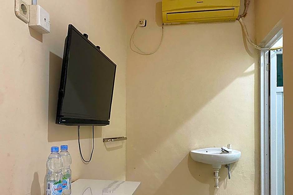 CK Homestay Syariah near Lippo Plaza Jambi Mitra RedDoorz