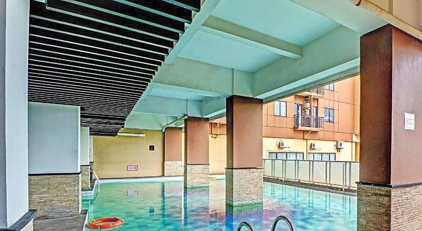 OYO Life 92735 Apartemen Tamansari Panoramic By Santuy