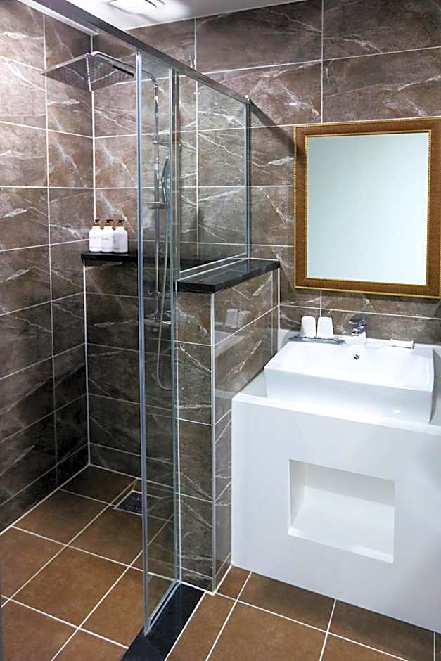 Photo 1 of 2 of Triple Room