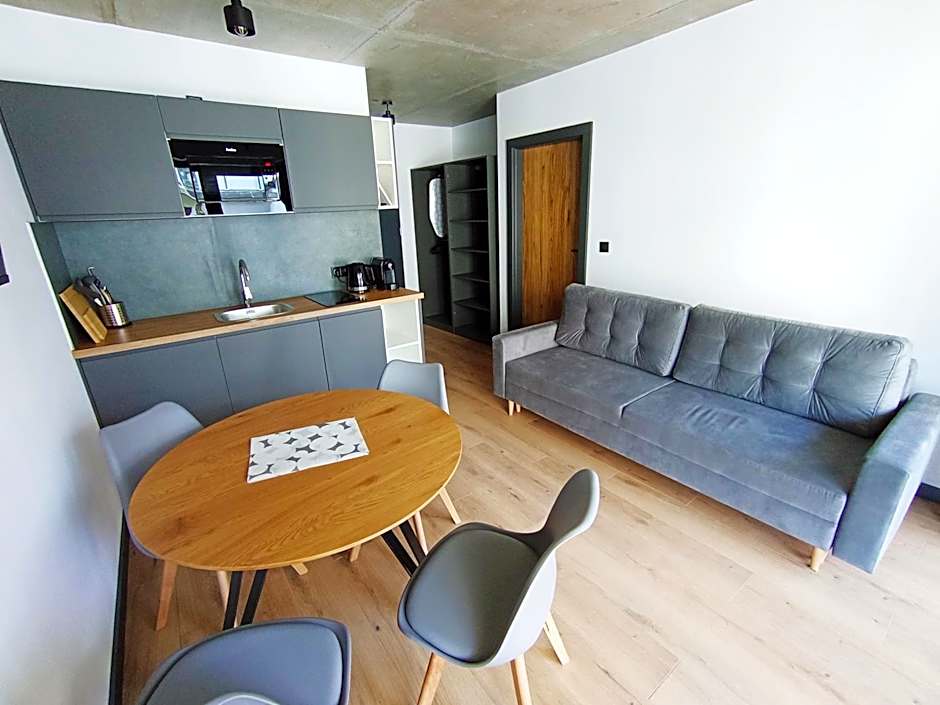 APARTAMENTY PIASKOWE BŁĘKITNA