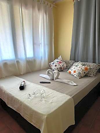 Quarto à 500m da praia Espaco Aconchego do Gugu