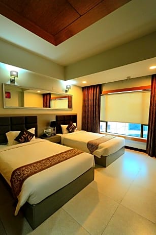 Deluxe Twin Room with 10% Discount On Happy Hours(3PM to 10PM), F&B, Spa, Laundry