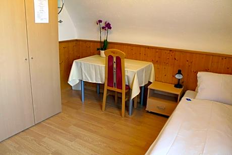 Single Room with Shared Bathroom