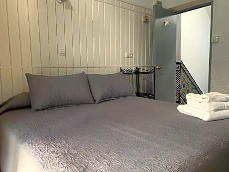 Quadruple Room with Private Bathroom