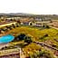 Lofts with private outdoor area and swimming-pool in Badesi
