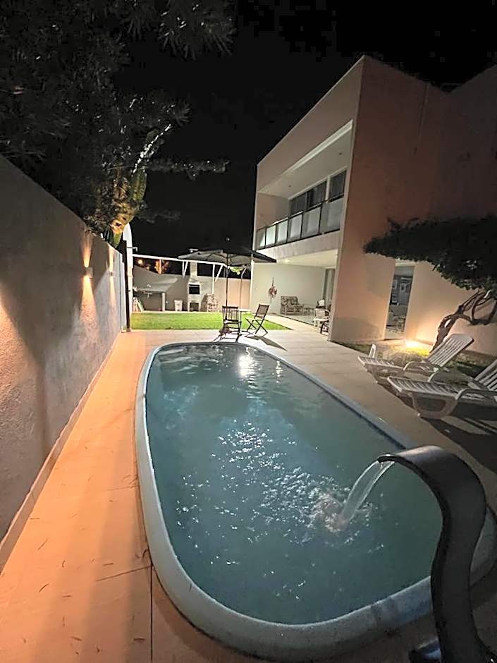 casa de praia com piscina para famílias