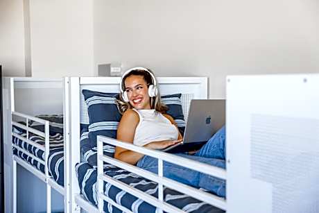 Bed in 4-Bed Female Dormitory Room with Shared Bathroom