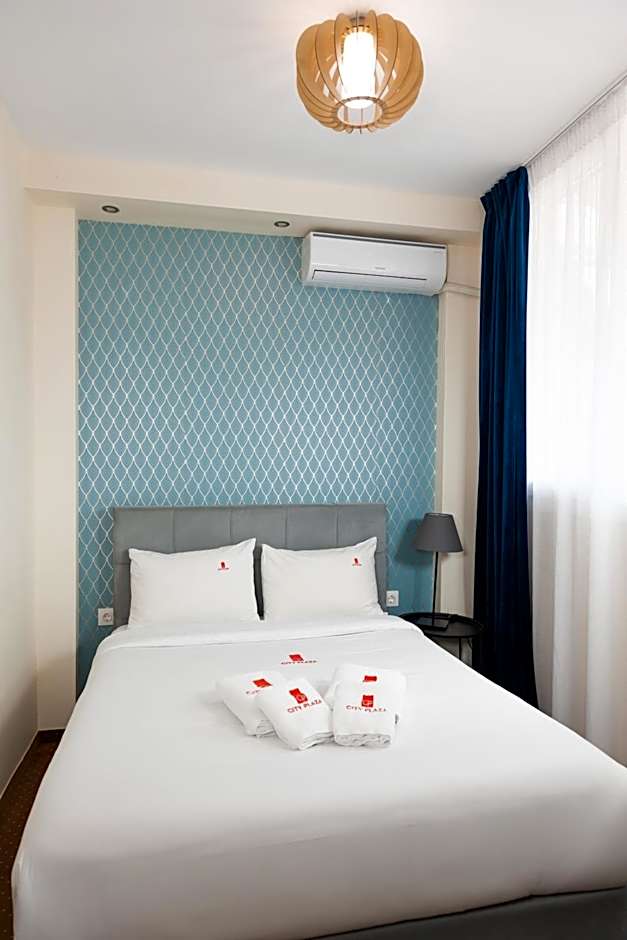 City Plaza Apartments & Rooms