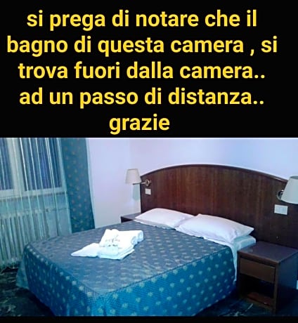Quadruple Room with Private Bathroom in the hallway