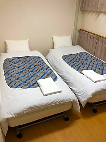 Standard Twin Room with Shared Bathroom