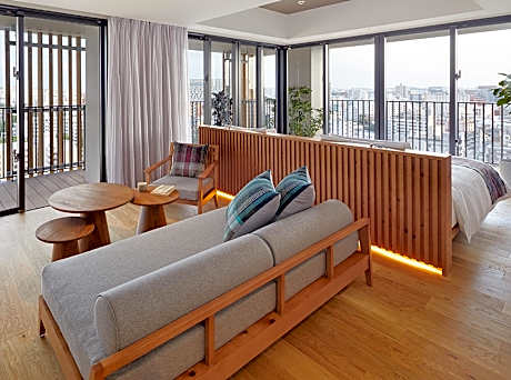Corner Deluxe Twin with Sofa Bed
