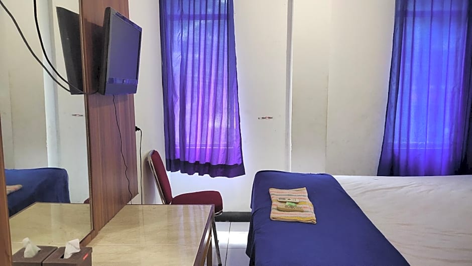 De' Premium Hotel Musi Raya 