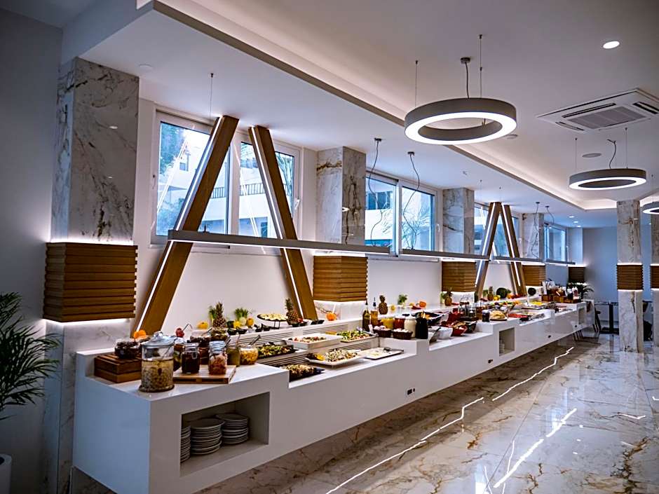 Elmi Beach Hotel & Suites