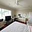 A cozy bedroom with a private washroom close to YVR Richmond