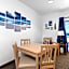 Beach House Inn & Suites
