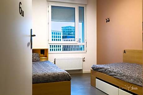 Single Bed in Female Dormitory Room