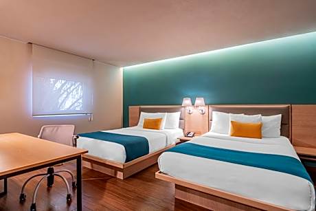Junior Double Suite with Two Double Beds and Sofa Bed