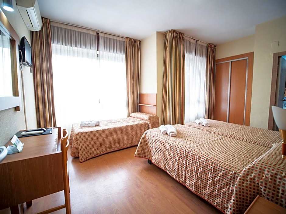 Photo 1 of 6 of Triple Room