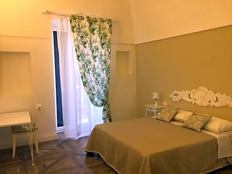 Quadruple Room with Private Bathroom