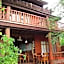 Riverhouse-The Teak House
