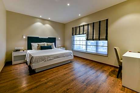 Junior Suite with Complimentary shuttle transfers to and from Sai Baba Temple (round trip). Advance reservation required.