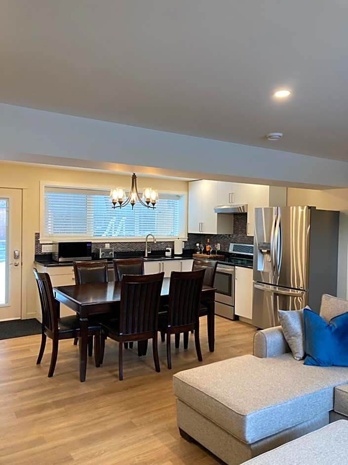 Bright poolside walkout two bedroom basement suite in the Okanagan