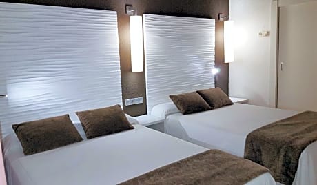 Quadruple Room (3 Adults + 1 Child)