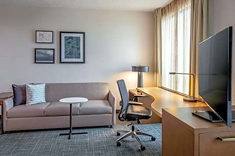 One-Bedroom King Suite with Sofa Bed and Roll-in Shower - Mobility and Hearing Accessible