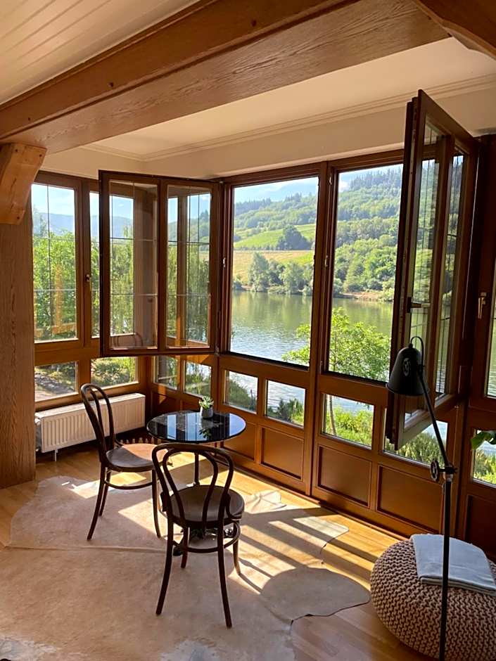 Photo 1 of 50 of Boutique Guesthouse Das WOHLGEMUTH HEIM Mosel Weingut