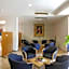 City Hotel & Suites