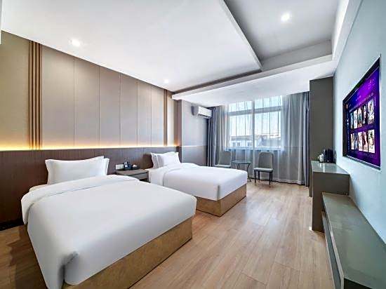 Nanyuan e Home Hotel (Cixi Palm Qi Branch)