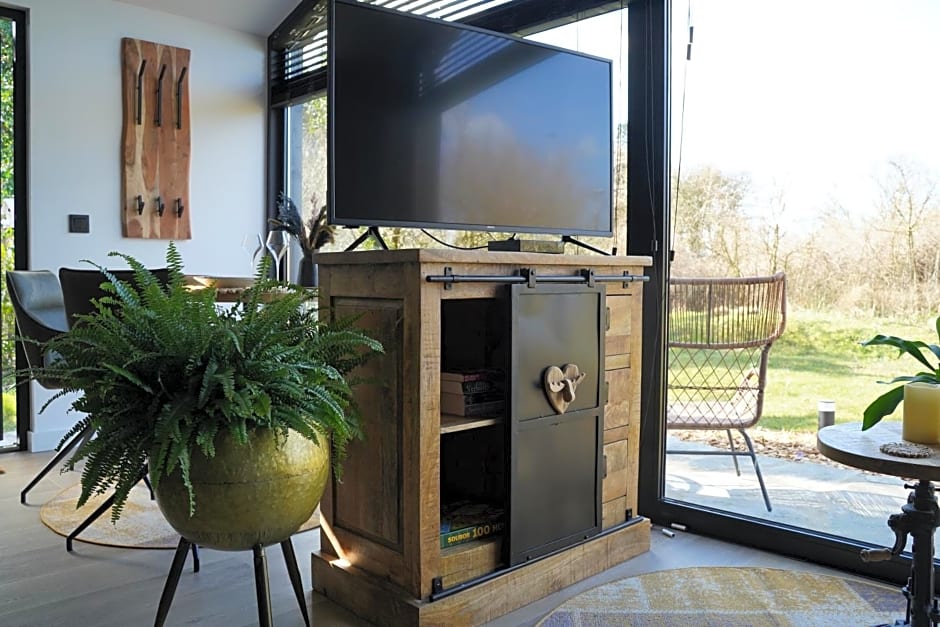 B&B het duinhuisje met jacuzzi, gratis parkeren, 2 fietsen te leen, airco